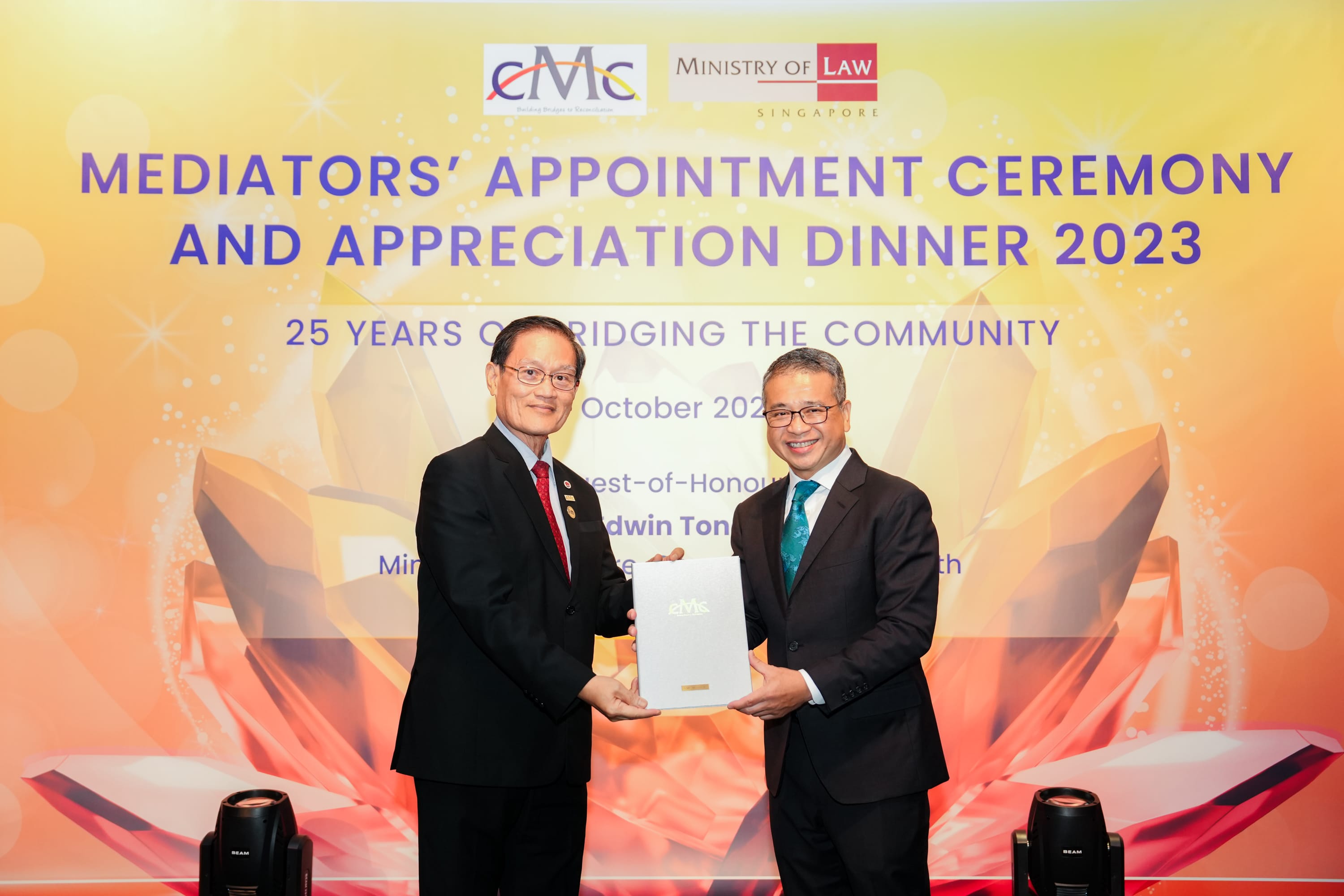 re-appointment image 2 award with Min Edwin